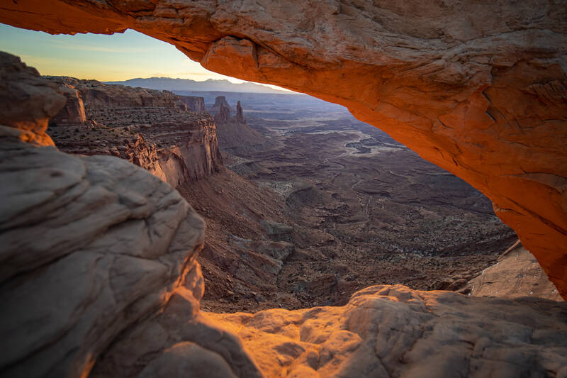 Photo of Mesa Arch lit ny the sunlight. Canyonlands.