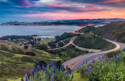 Photograph of the Golden Gate Bridge at sunset.
