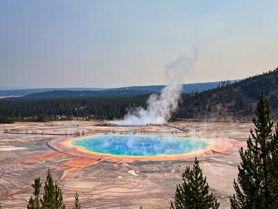 Photo of Grand Prismatic Spring from a viewpoint above. Yellowstone. Summer.