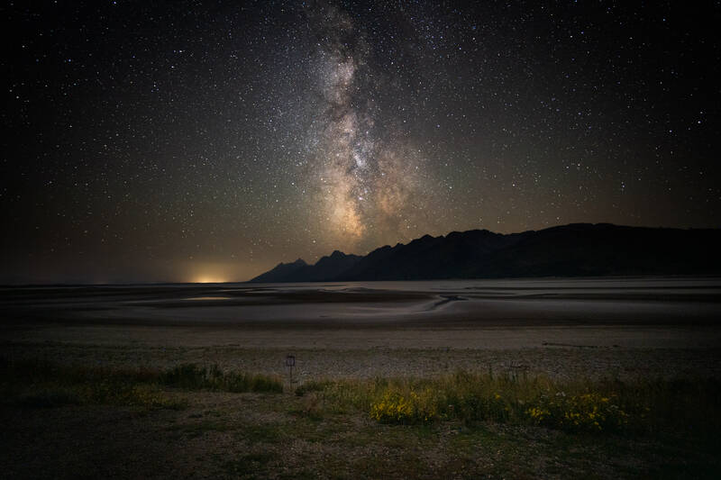 Photo of Milky Way over Grand Tetons and an emaciated Jackson Lake. Summer.
